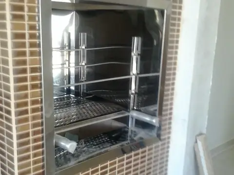 Revestimento de churrasqueira em inox feito pela Coifas MM – foto 1