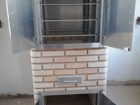 Revestimento de churrasqueira em inox feito pela Coifas MM – foto 11